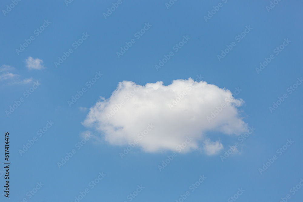 Beautiful fluffy white clouds in dramatic cloudscapes. Blue sky with