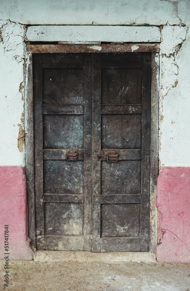 wooden door in abandoned house in the andes of Peru