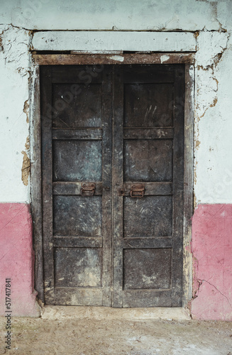 wooden door in abandoned house in the andes of Peru © BlkG
