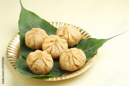 Modak, made from flour and coconut jaggery filling. Modak is a traditional Indian sweet made during Ganesh Utsav and also offered to lord Ganesha.