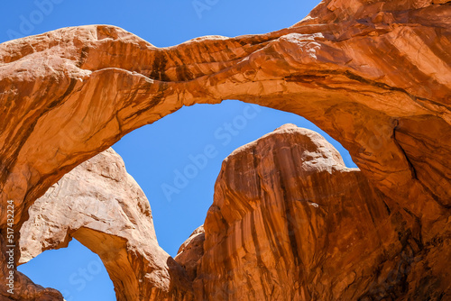 Arches canyon stone with a blue sky . the symbol of Utah and explore travel concept. © paulynn