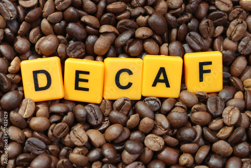 Canvas Print Decaf word on roasted coffee beans background
