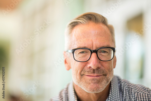 Mature handome fit man sitting outside stock photo