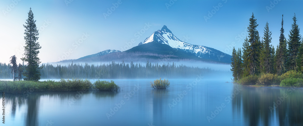 Amazing nature photography from Oregon with montains, lake, trees. Beautiful reflection in water.