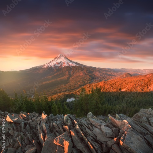 Dramatic and Majestic View of Mount Hood on a bright, colorful sunset during the summer months. The Pacific Northwest, Oregon, USA Beautifull mountains landscape. Stormy weather