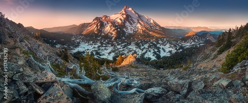 At 10,492 feet high, Mt Jefferson is Oregon's second tallest mountain.Mount Jefferson Wilderness Area, Oregon The snow covered central Oregon Cascade volcano Mount Jefferson rises above a pine forest photo