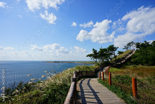fascinating seascape with seaside walkway and clouds