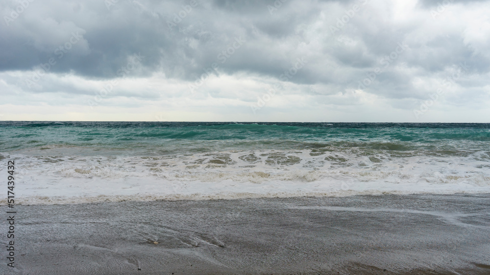 Seascape with overcast skies and stormy waves