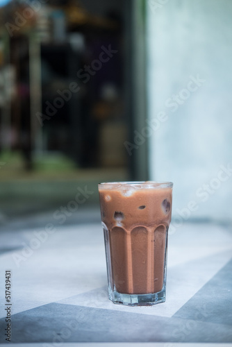 Iced mocha coffee, shot of espresso coffee mixed chocolate put in ice in glass