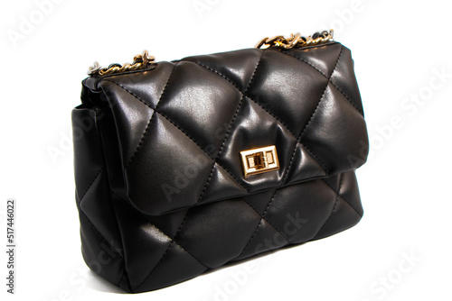 quilted leather bag in black. Women's fashionable clutch isolate on a white background. hand bag with handle. fashion trends 2022. High quality photo photo