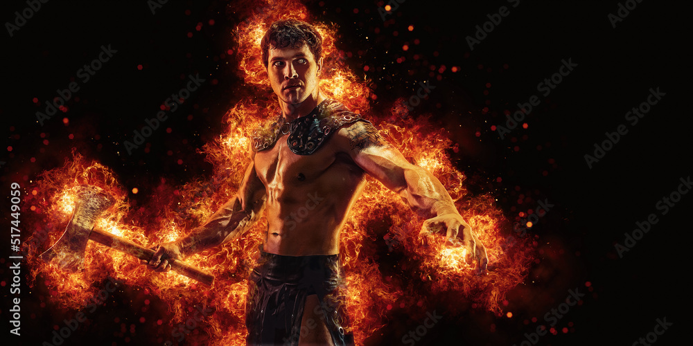 Portrait of burning barbarian with naked torso who posing holding axe in dark studio background Portrait of burning barbarian with naked torso who posing holding axe in dark studio background