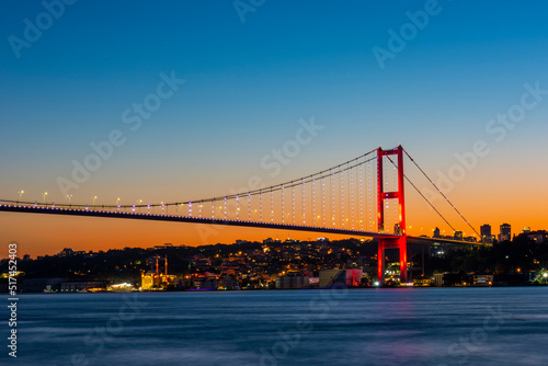 Istanbul Bosphorus Bridge with sunset view. 15th July Martyrs Bridge. Istanbul, Turkey. © resul