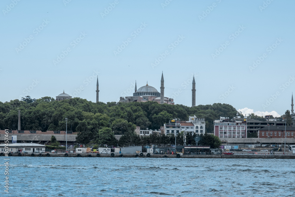Wide angle Istanbul view with Hagia Sophia Mosque, beautiful landscape with trees, footage of cityscape and mosque, travel with ferry tour in Istanbul