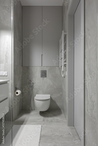 modern bathroom interior with toilet  bathroom with gray tiles with stone texture