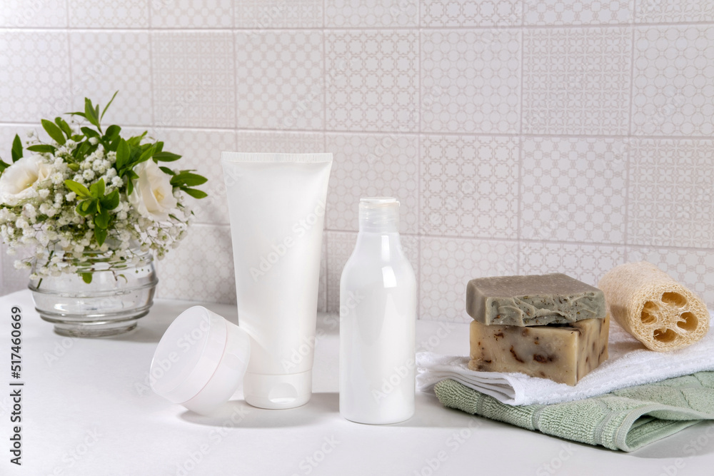 Natural cosmetics, skin care product on table in bathroom. Blank cosmetic skincare makeup containers. Natural cosmetics, skin care product on table in bathroom. Blank cosmetic skincare makeup containers.