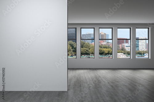 Panoramic picturesque city view of Boston at day time from modern empty room, Massachusetts. An intellectual and political center. Mockup copy space empty wall. Display concept. 3d rendering. © VideoFlow