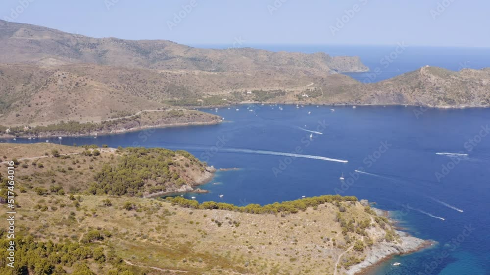 Aerial of Mountains and Sea with Yachts Near Mediterranean Town of Roses, Spain Aerial of Mountains and Sea with Yachts Near Mediterranean Town of Roses, Spain
