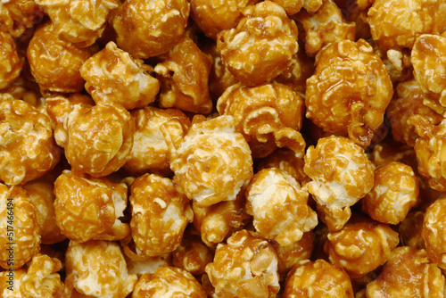 Caramel popcorn background, top view, flat lay	