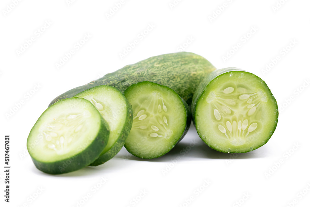 Fresh cucumber slices over on white background Fresh cucumber slices over on white background