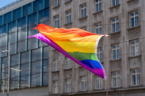 Rainbow flag waving in the wind at a CSD demonstration in Leipzig against discrimination of lesbians, gays, bisexuals, transgender persons and intersexuals