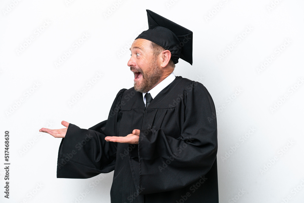 Middle age university graduate man isolated on white background with surprise facial expression Middle age university graduate man isolated on white background with surprise facial expression