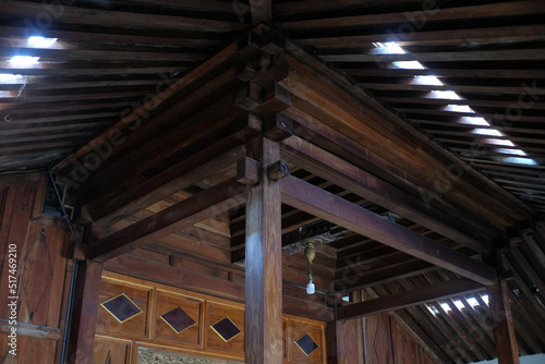 Tumpang Sari, core construction and roof truss characteristics in the Javanese Joglo traditional house. Wooden beams are arranged like inverted pyramids. photo