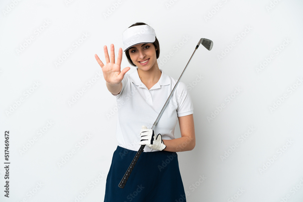 Handsome young golfer player woman isolated on white background counting five with fingers Handsome young golfer player woman isolated on white background counting five with fingers