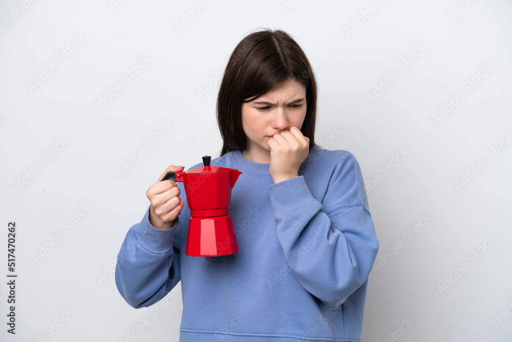 Young Russian woman holding coffee pot isolated on white background having doubts Young Russian woman holding coffee pot isolated on white background having doubts