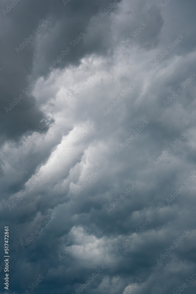 dramatic cloudy dark clouds before a storm. deep blue and grey heavy clouds. weather forecast dramatic cloudy dark clouds before a storm. deep blue and grey heavy clouds. weather forecast