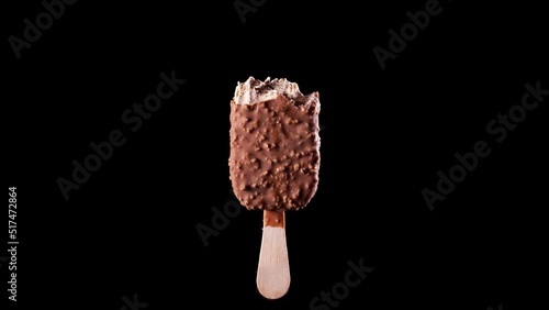 Stop motion animation of a chocolate hazelnut ice cream being eaten