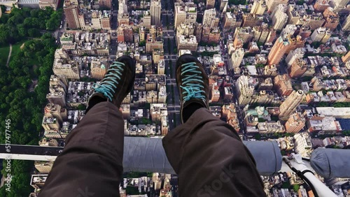 POV of Mans Legs Dangling Off a Helicopter Flying Over Manhattan, New York 