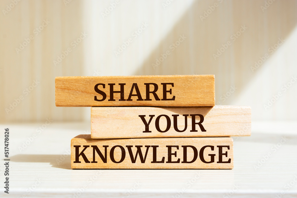Wooden blocks with words 'SHARE YOUR KNOWLEDGE'. Wooden blocks with words 'SHARE YOUR KNOWLEDGE'.