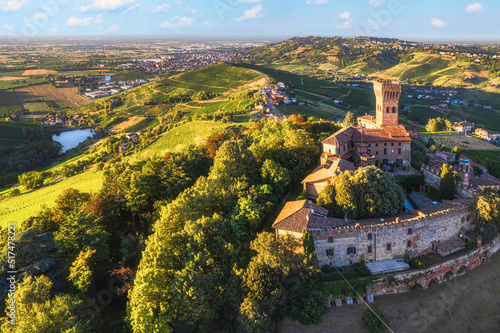 Aerial view of Cigognola Castle with his vineyard in background, Oltrepo Pavese, Pavia, Lombardy, Italy photo