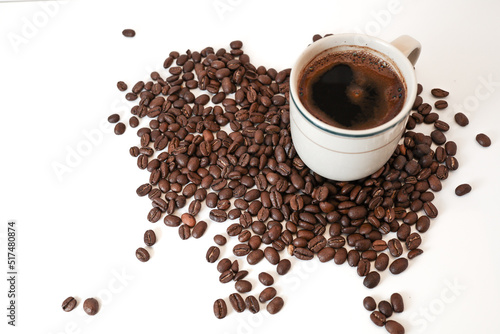 hot espresso and coffee beans arabica or robusta on white table with white background. top view 