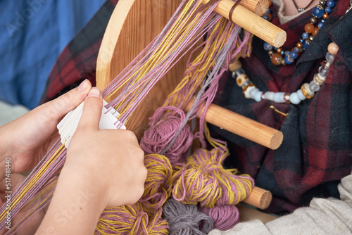 Photos An ancient Roman woman makes yarn and sews from vintage wool