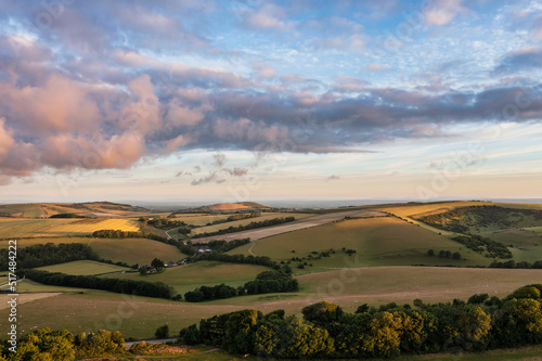 Gorgeous aerial drone landscape image of South Downs NP at sunrise in Summer