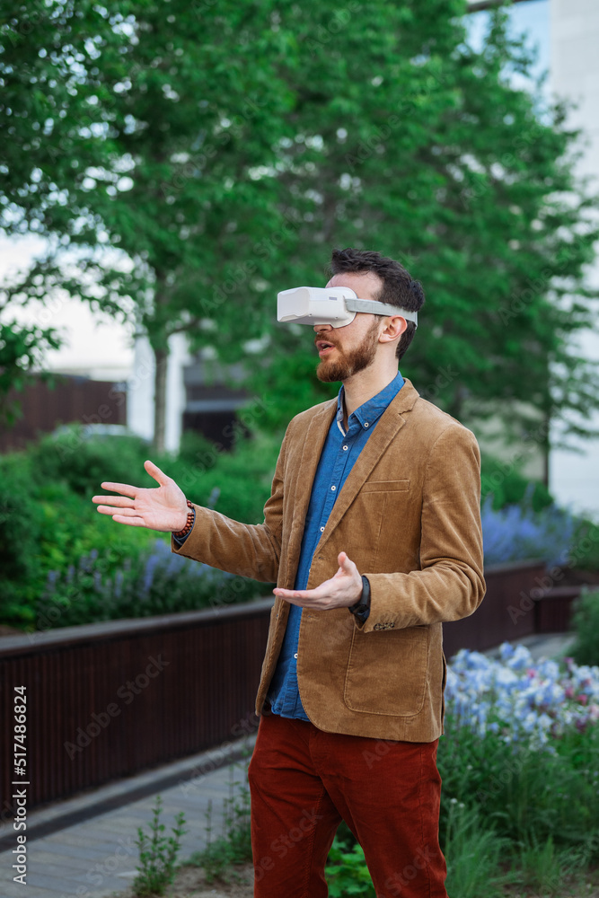Foto de Portrait of man in virtual reality glasses. Guy in VR headset
