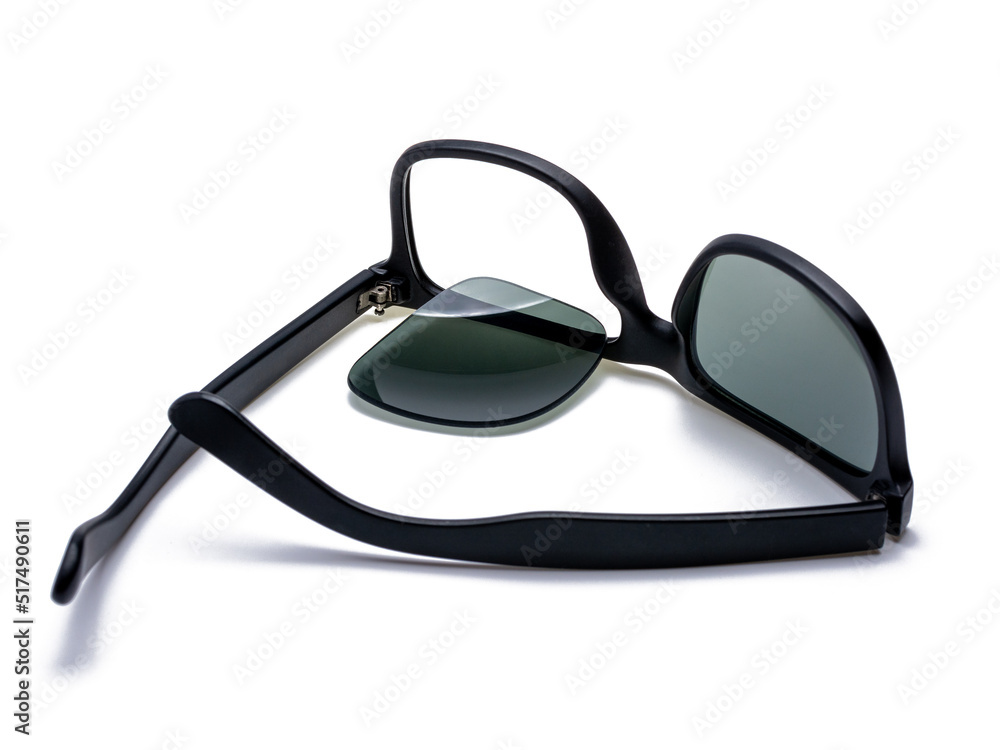 Black broken sunglasses, the lens fell out of the frame, isolated on