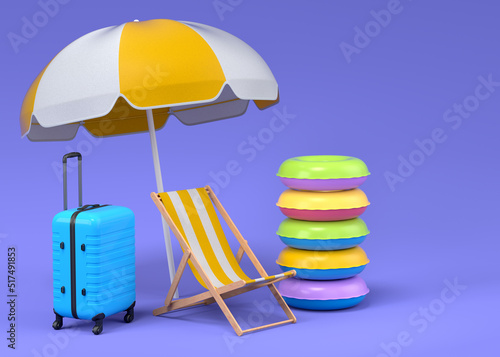 Colorful beach rings, chair, umbrellas and lugagge on blue background. photo