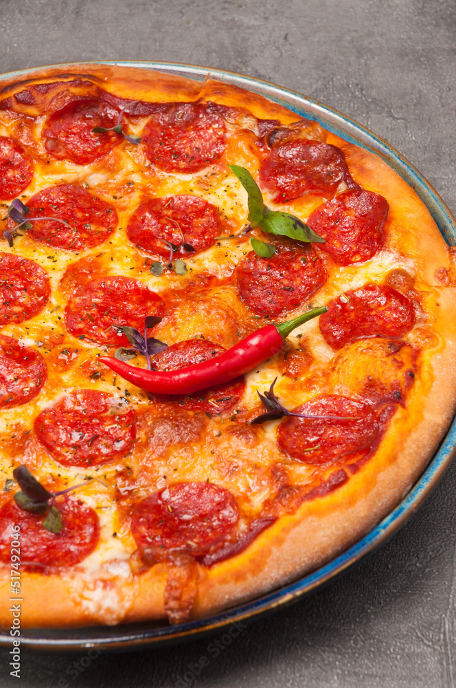 pepperoni pizza is a classic Italian pizza with mozzarella cheese. close-up pepperoni pizza is a classic Italian pizza with mozzarella cheese. close-up