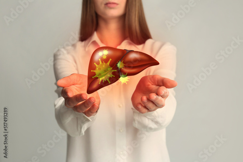 Woman and illustration of unhealthy liver on light grey background. Viral hepatitis