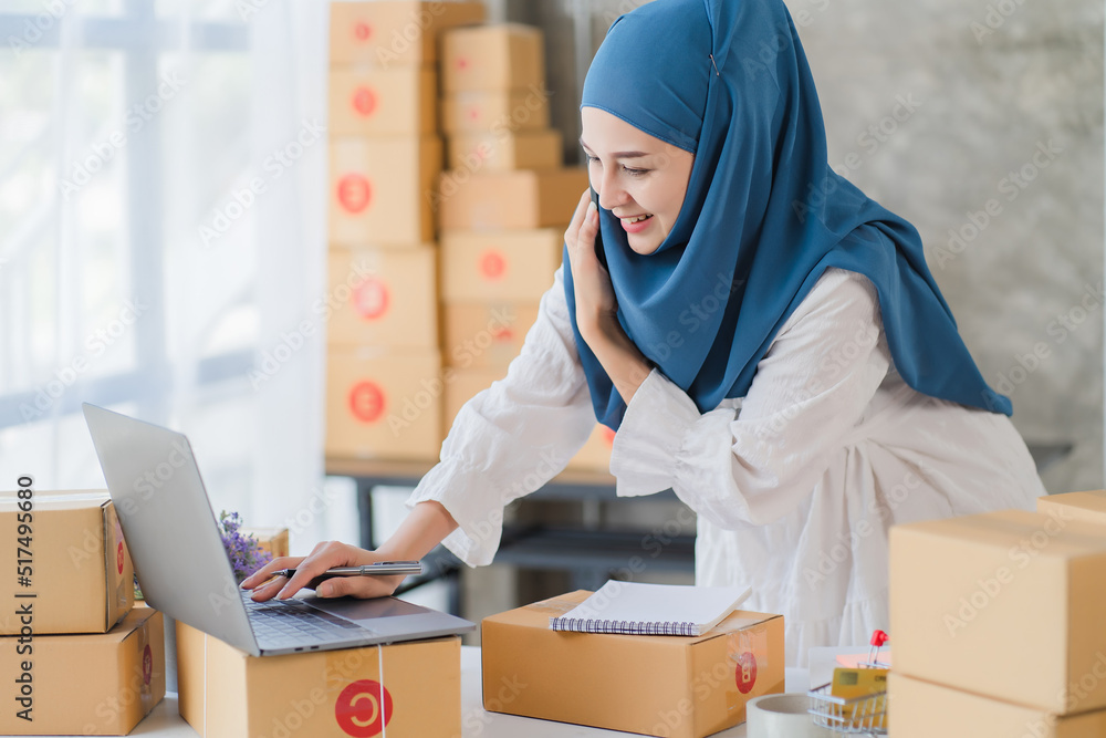 Beauty muslim woman in hijab working in the office Beauty muslim woman in hijab working in the office