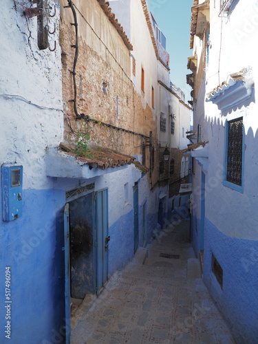 Desolate arabic alley in Chefchaouen city in Morocco - vertical © Jakub Korczyk
