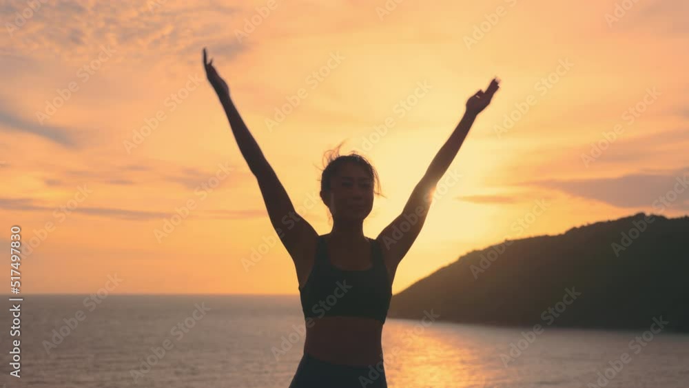 Asian woman improves balance for body, mind and spirit with yoga Asian woman improves balance for body, mind and spirit with yoga