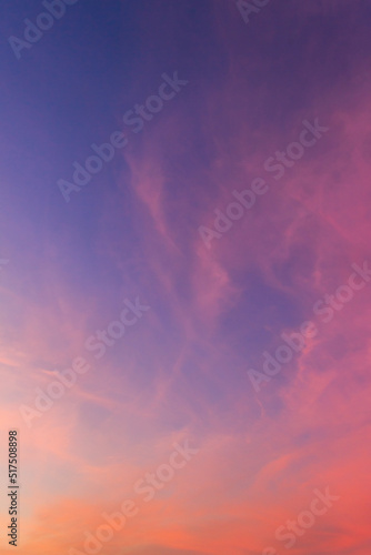 Fotografiet Dusk sky vertical with colorful sunlight clouds in the evening on twilight sky b