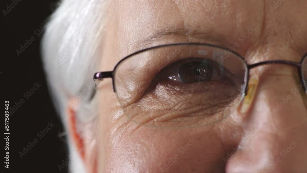 Portrait of a senior woman staring with hope for humanity. Closeup of a grandma with reading glasses for vision correction. Face and eyes of a wise lady thinking of a happy memory while daydreaming Portrait of a senior woman staring with hope for humanity. Closeup of a grandma with reading glasses for vision correction. Face and eyes of a wise lady thinking of a happy memory while daydreaming