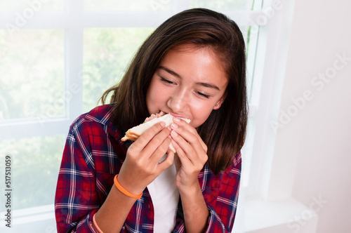 Teenage girls enjoy eating breakfast before go to school, Back to school concept