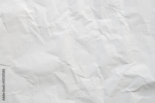 White crumpled and creased paper texture background