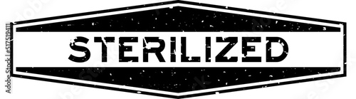 Grunge black sterilized word hexagon rubber seal stamp on white background