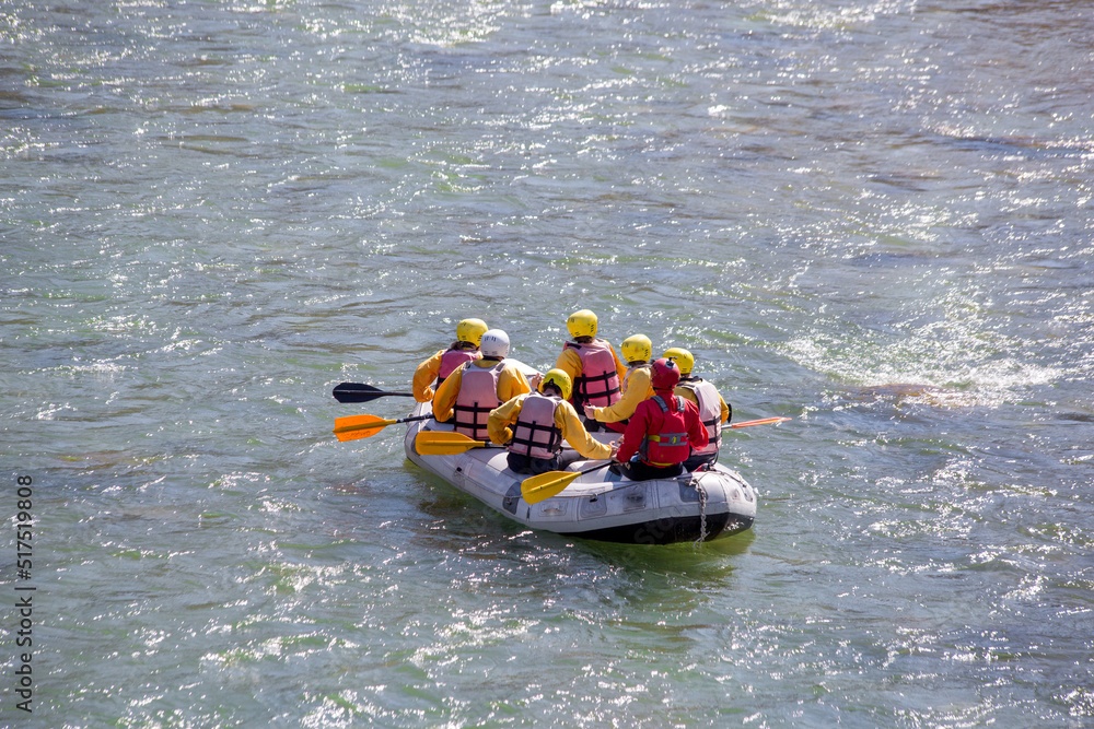 rafting boat colors people rowing in Arahthos river Arta Greece